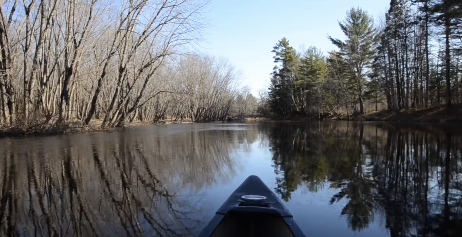 A photo of a canoe in a river